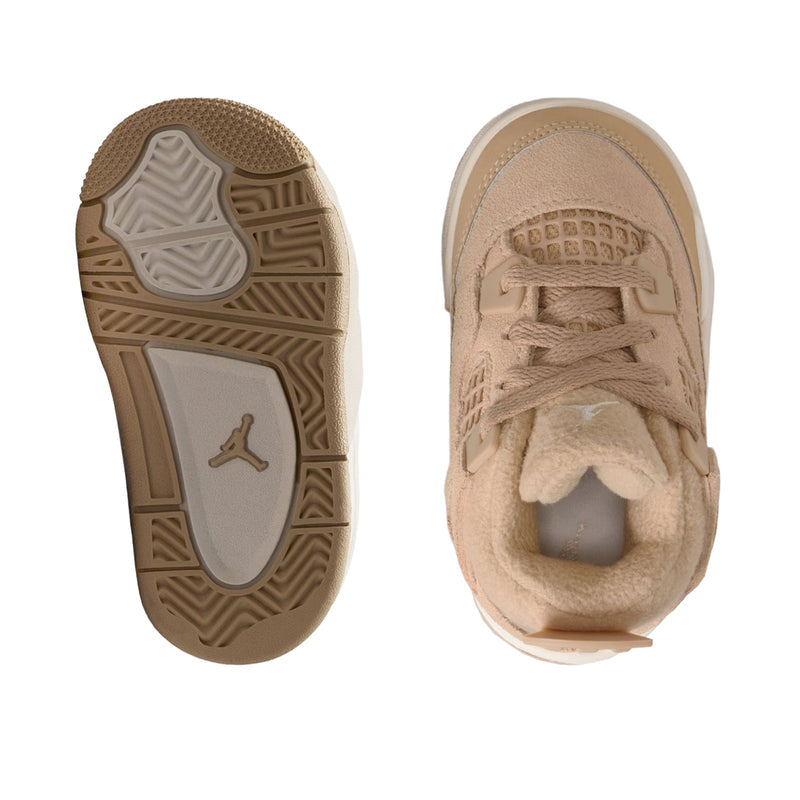 Tan toddler sneaker with Jumpman logo, showing outsole tread and shoe interior