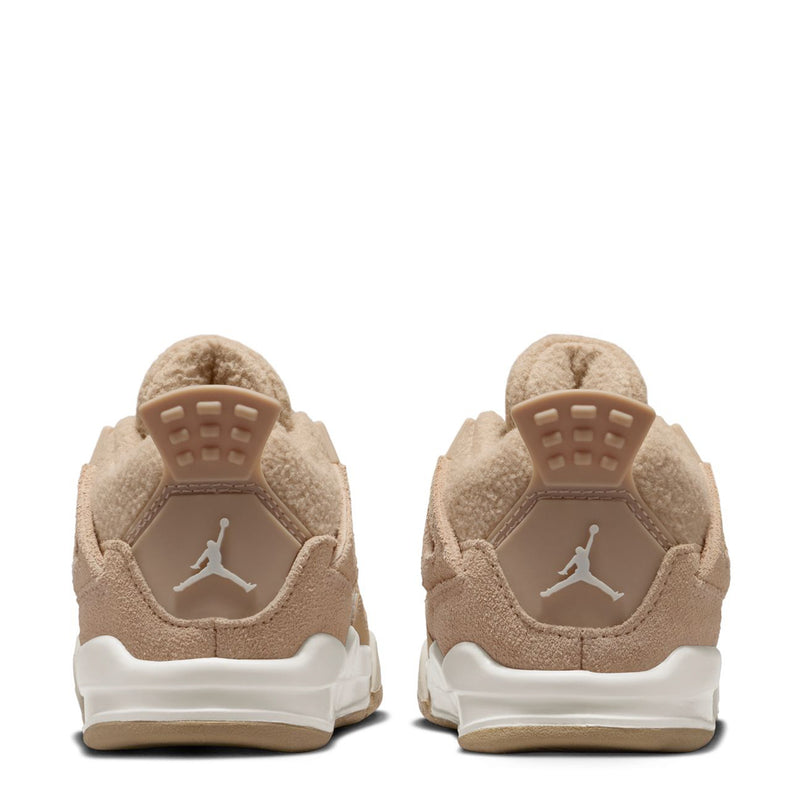Tan toddler sneaker heel view with Jumpman logo and cushioned ankle lining