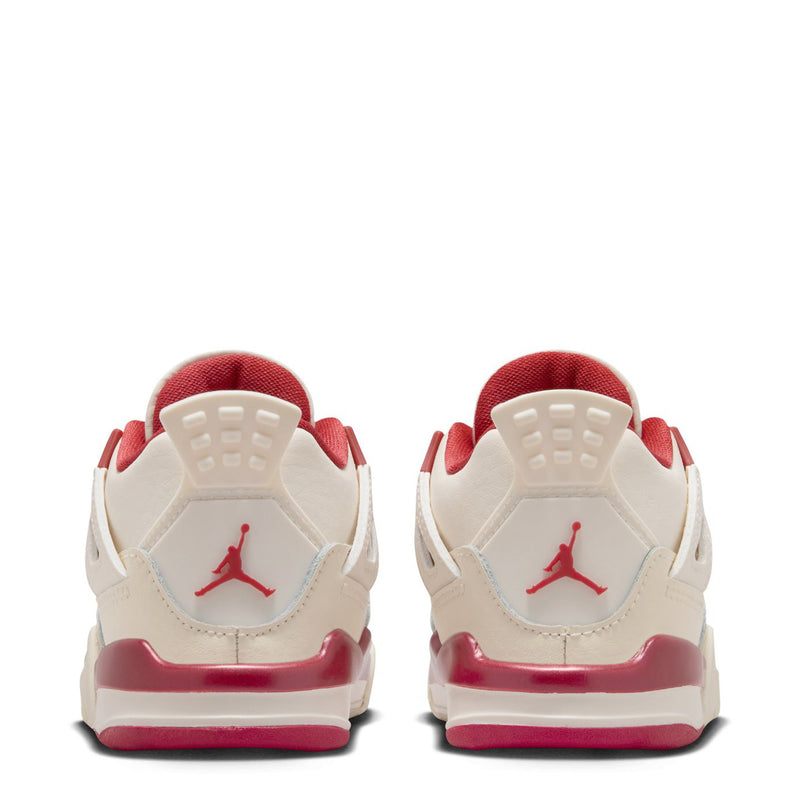 Kids' sneaker heel back view, pale ivory leather with red heel trim