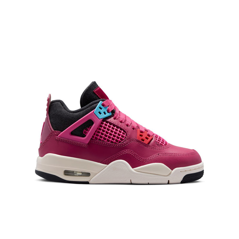 Youth sneaker in deep pink with black lining, mesh panels, and white midsole