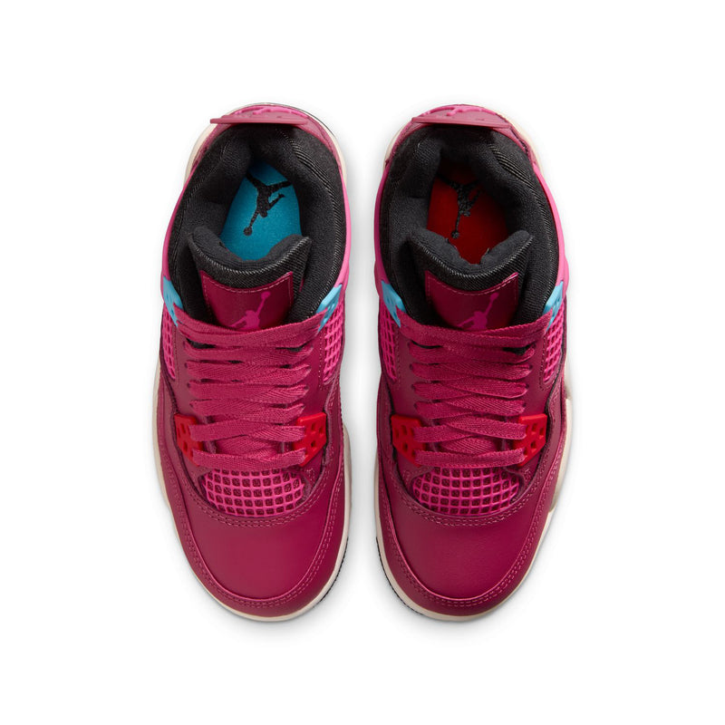 Youth pink sneakers viewed from front, showing lace-up mesh and padded collars
