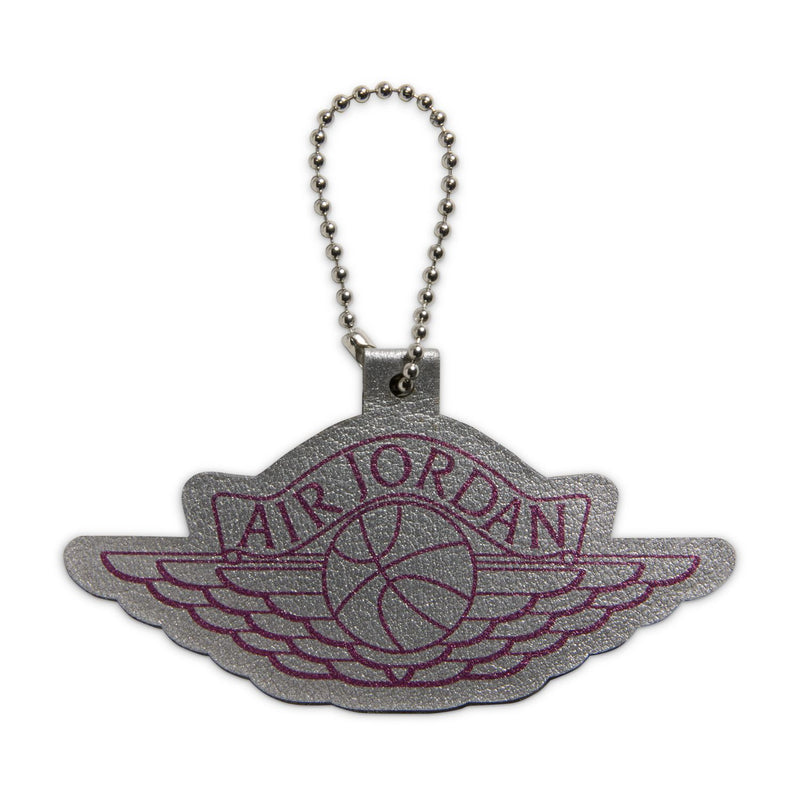 Grey and pink Air Jordan wings keychain with ball graphic and bead chain