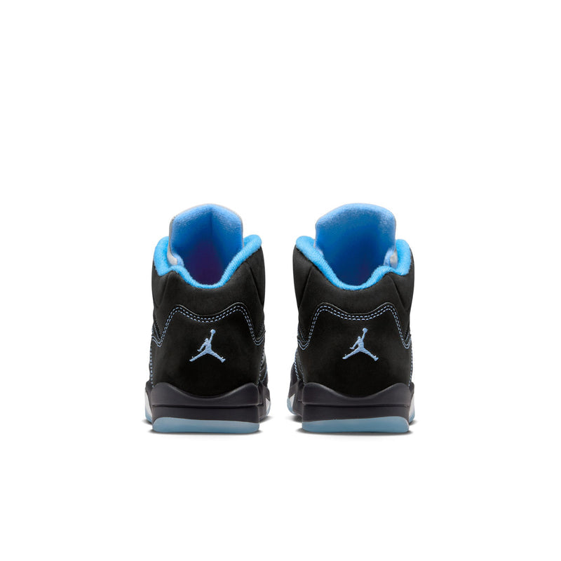 Kids' black retro sneakers with blue heel lining and Jumpman logo on back