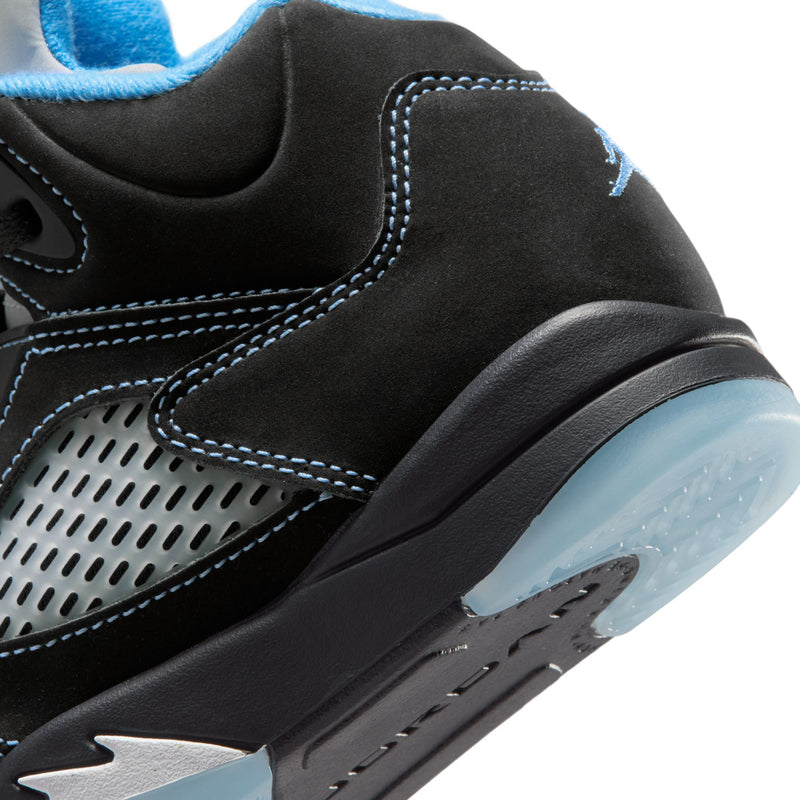 Kids' black retro sneakers with blue stitching, perforated side, and cushioned sole