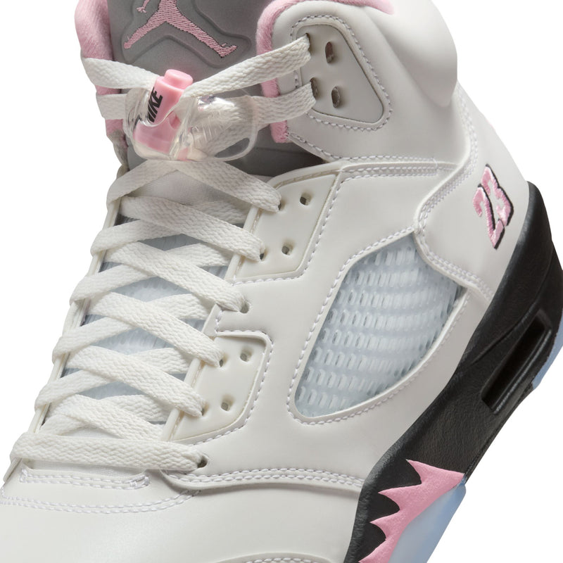 White lace-up sneakers with blue mesh side panel, pink accents, and molded eyelets