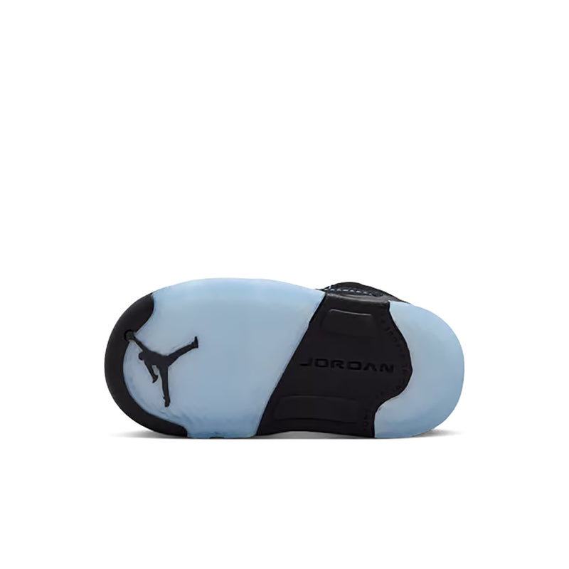 Toddler sneaker outsole view with blue midfoot and black heel panel