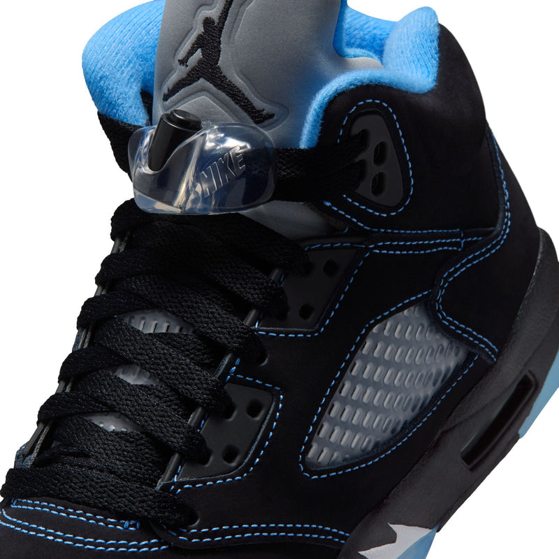 Air Jordan 5 youth close-up, black upper with blue accents and Jumpman ankle graphic