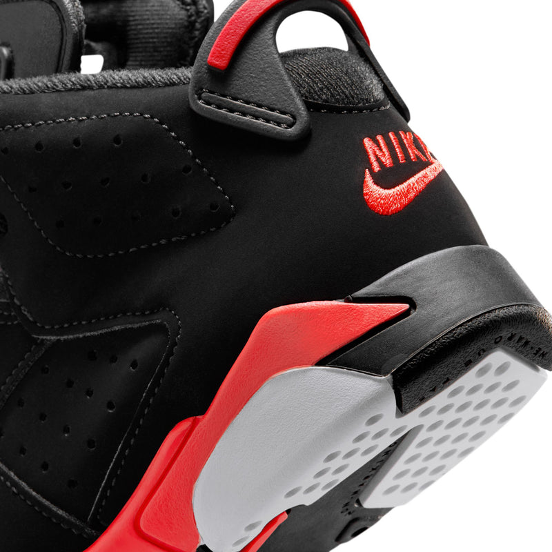 Kids black high-top sneaker outsole view with red midsole stripe and NIKE logo