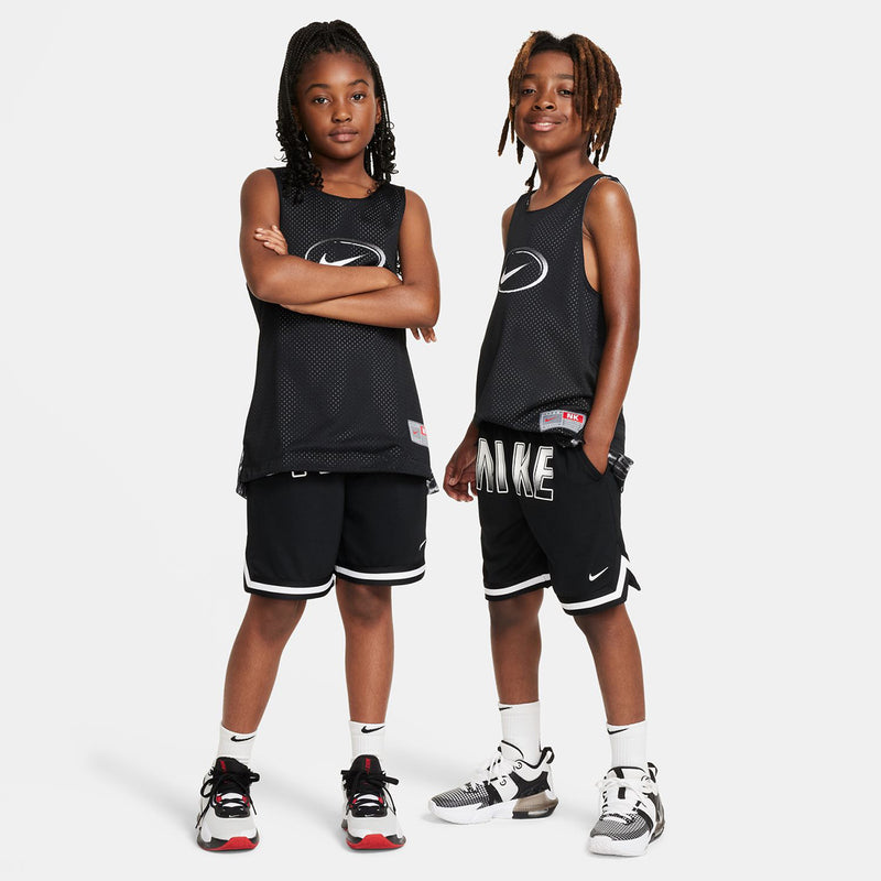 Youth reversible jersey, black sleeveless tank with Nike swoosh front design.