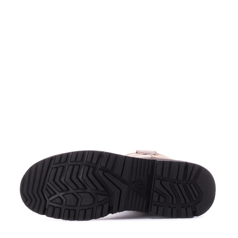 Boot outsole with black rugged tread pattern and dark brown upper edge