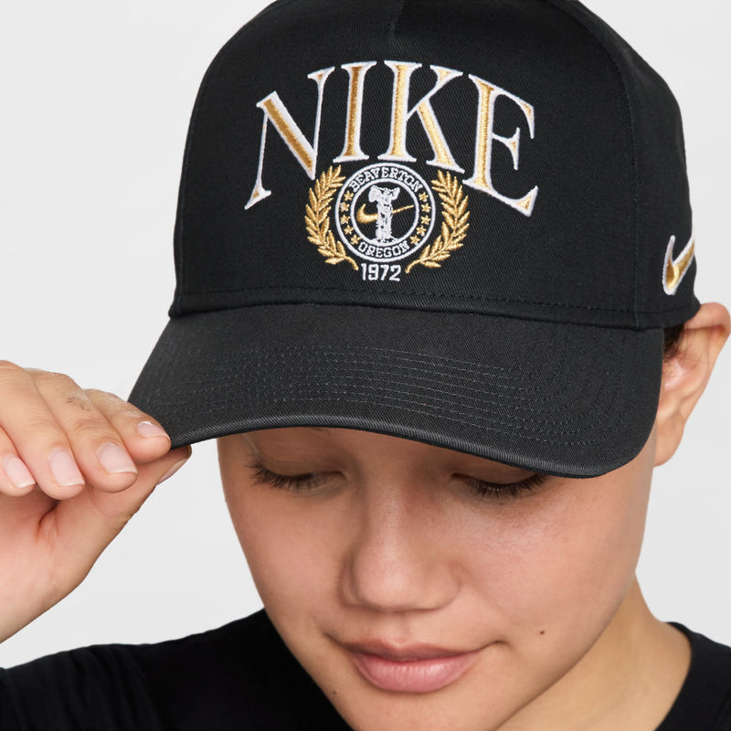 Black Nike structured cap with front crest logo and curved bill