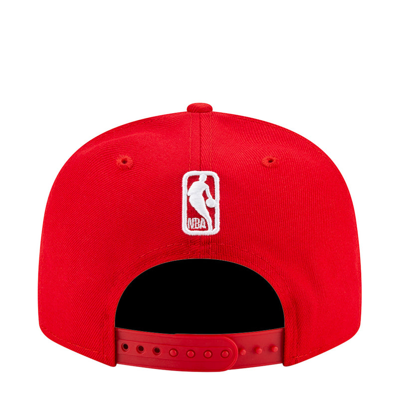 Red baseball cap with white embroidered back logo and black underbrim
