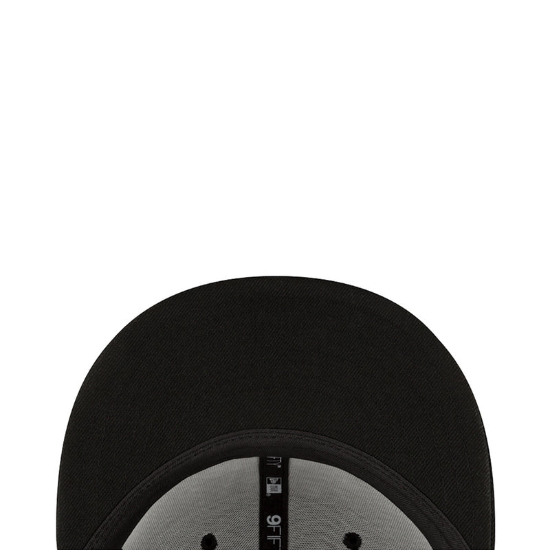 Black cap interior close-up with New Era label on the inner band