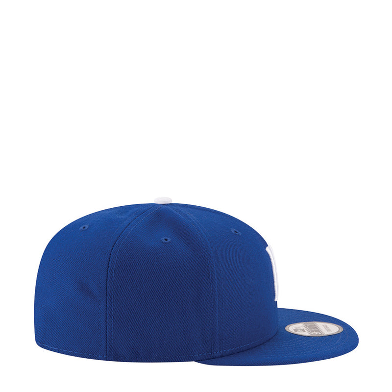 Royal blue baseball cap back view with ventilation eyelets