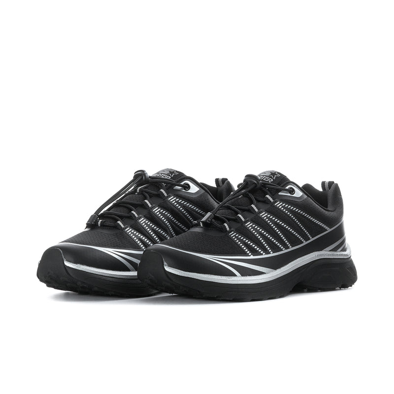 Black lace-up sneakers with silver ribbed panel design and thick rubber outsole