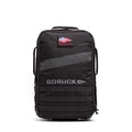 The Rucker 5.0 is a black GORUCK rucksack featuring an American flag patch, front handles, MOLLE webbing on the lower front, and built-in lumbar support for comfortable rucking.