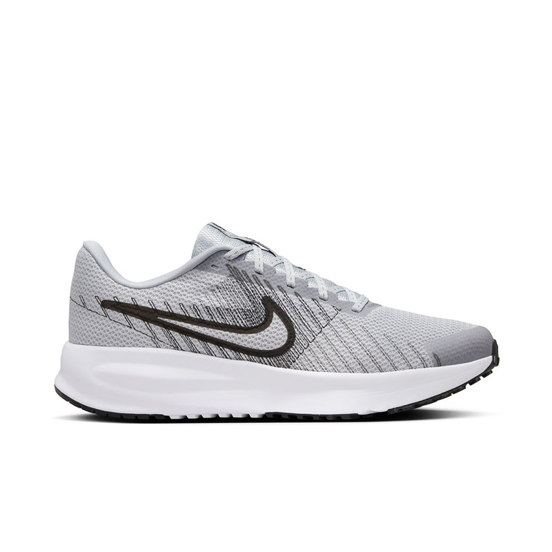 Men's running shoe in light grey knit with black swoosh and white sole, lace-up.
