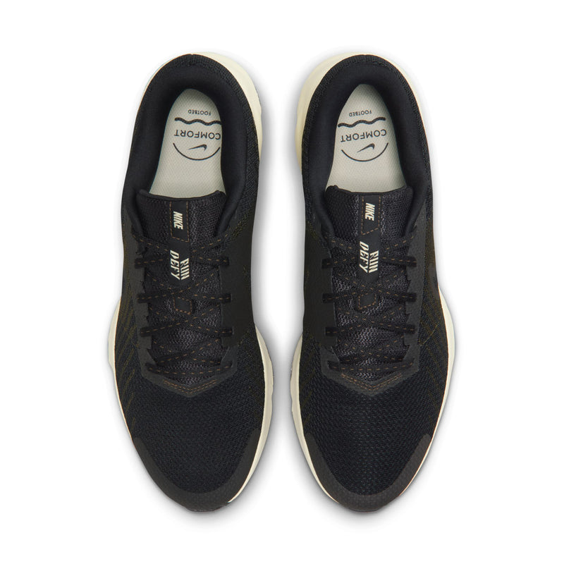 Men's Nike running shoe heels and insides, black fabric with white sockliner