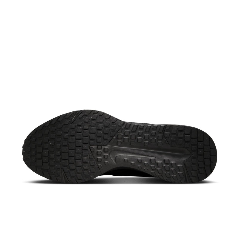 Men's running shoes outsole with grippy tread pattern and rubber traction pods.