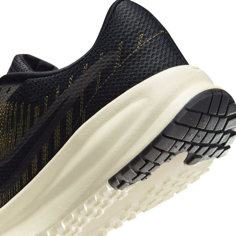 Men's Nike running shoe showing side knit texture and thick white midsole