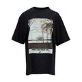 Black womens short-sleeve crewneck tee with framed running photo graphic and text