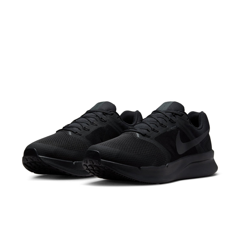 Black men’s running shoe with knit mesh upper, lace-up closure, and swoosh detail