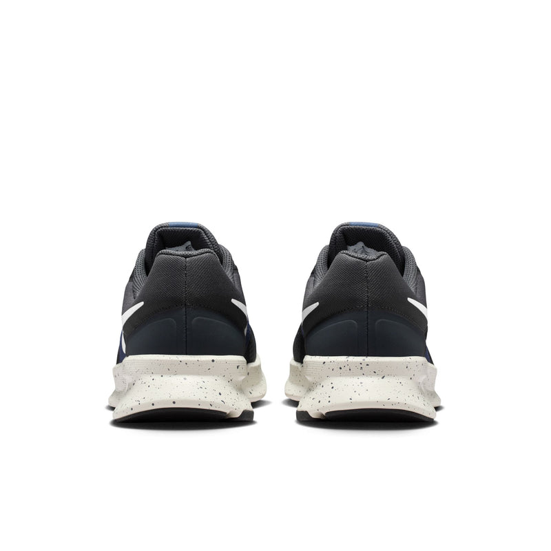 Mens running shoes rear view with dark upper, heel pull tab, and white speckled midsole