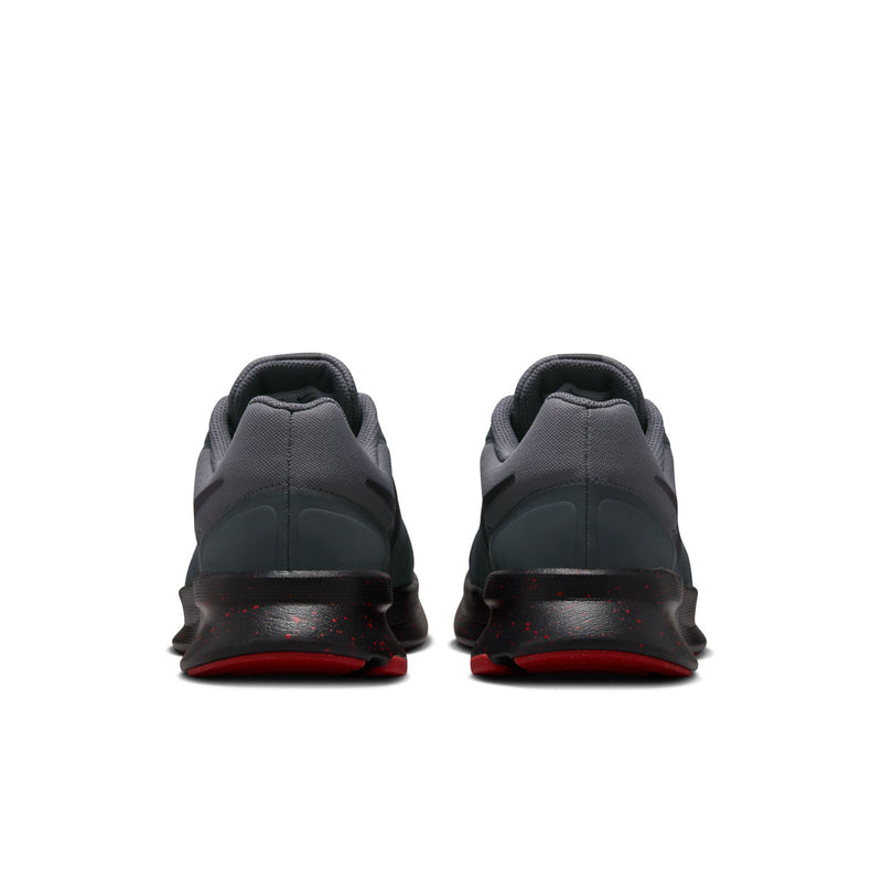 Men's dark gray running shoes with black heel panel and red outsole trim