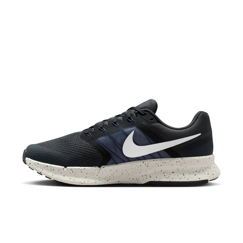 Mens dark navy/black low-top running shoe with white Nike swoosh and speckled sole