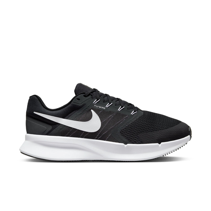 Men's black running shoe with white Swoosh and sculpted midsole, lace-up design.