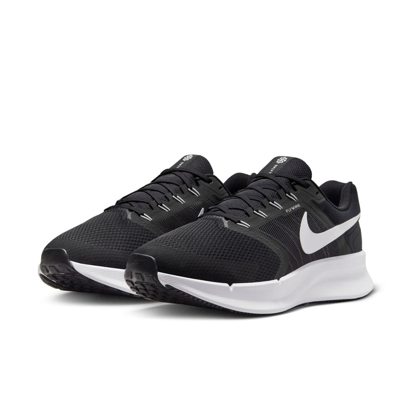 Men's black running shoe with white Swoosh, cushioned midsole and lace-up upper.