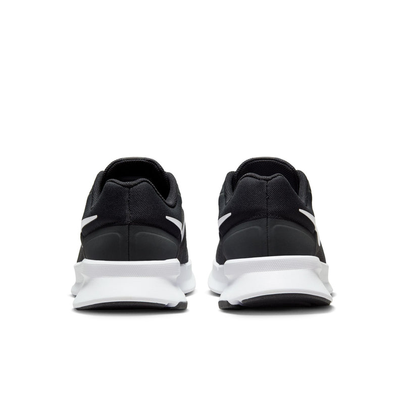 Back view of men's black running shoes with white midsole trim and padded heel cups.