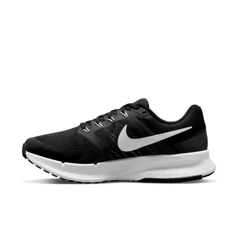 Black mesh running shoe with white Nike swoosh, lace-up front, and white midsole.