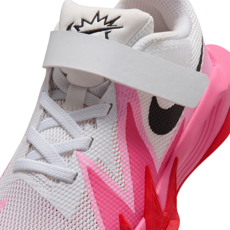 Kids' sneaker close-up: white laces, black logo on tongue, pink heel panel
