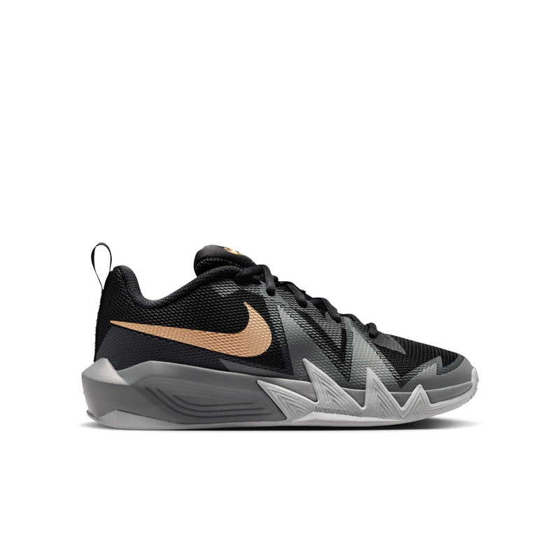 Youth basketball shoe in black with metallic gold and light gray accents