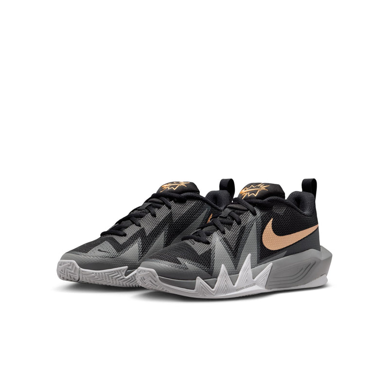 Youth basketball shoe, side view, black upper with gold swoosh and gray zigzag sole