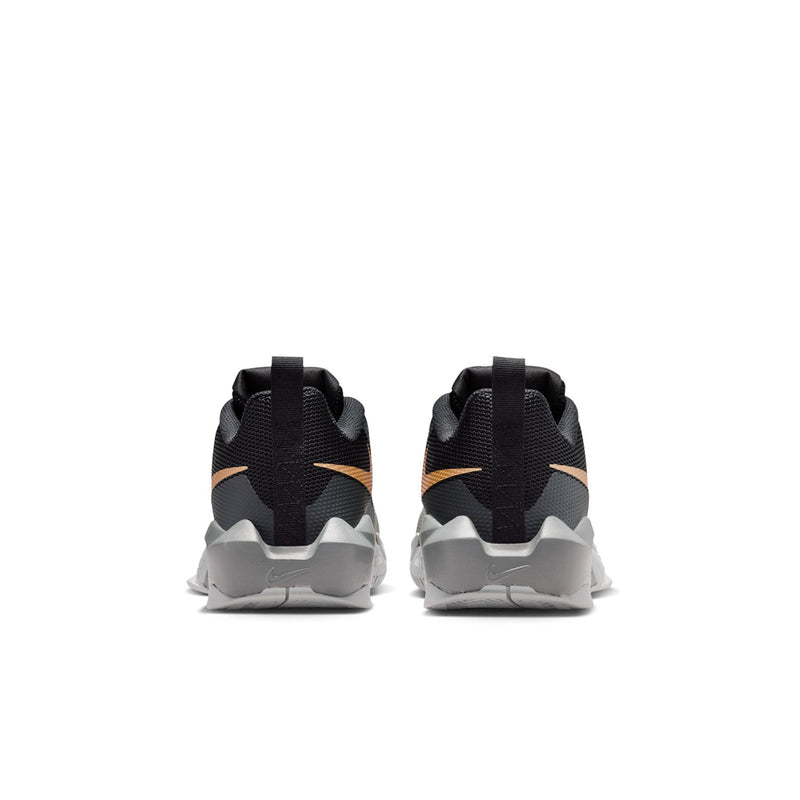 Youth basketball shoe rear view, black mesh with gold stripe accents and gray sole