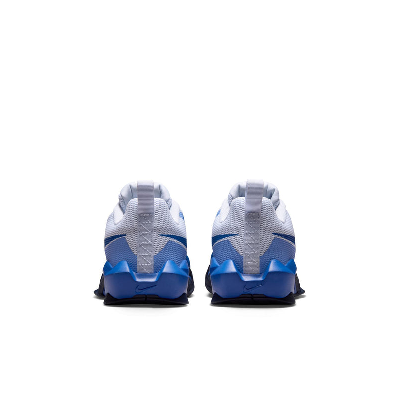 Youth sneakers heel view: light gray mesh with blue heel counter and pull tab.