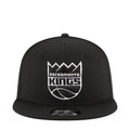 Black baseball cap with Sacramento Kings logo patch on front