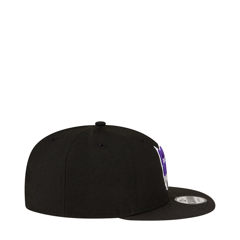 Black snapback baseball cap, side view with partial purple Kings graphic