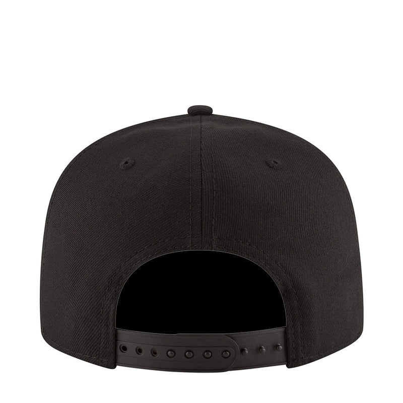 Black snapback cap with adjustable back strap and curved brim