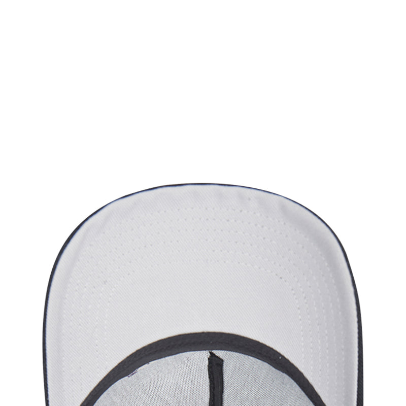 White mesh cap panel with black circular seam