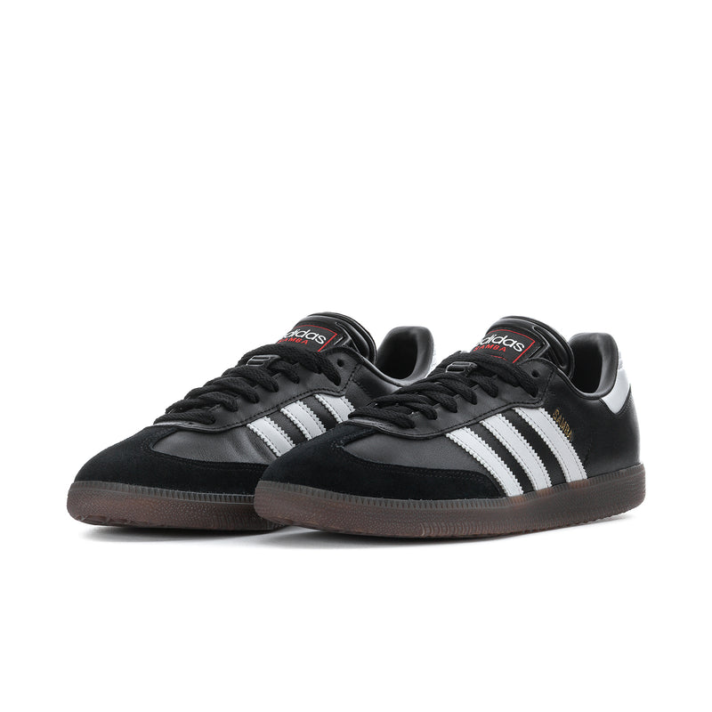 Men's black adidas Samba sneakers, side view with white three-stripe stripes