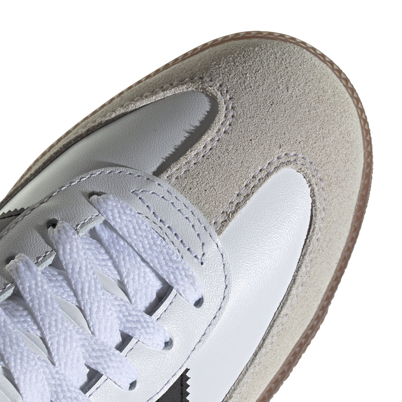 Men's adidas Samba Classic sneakers close-up of white toe panel with textured suede overlay