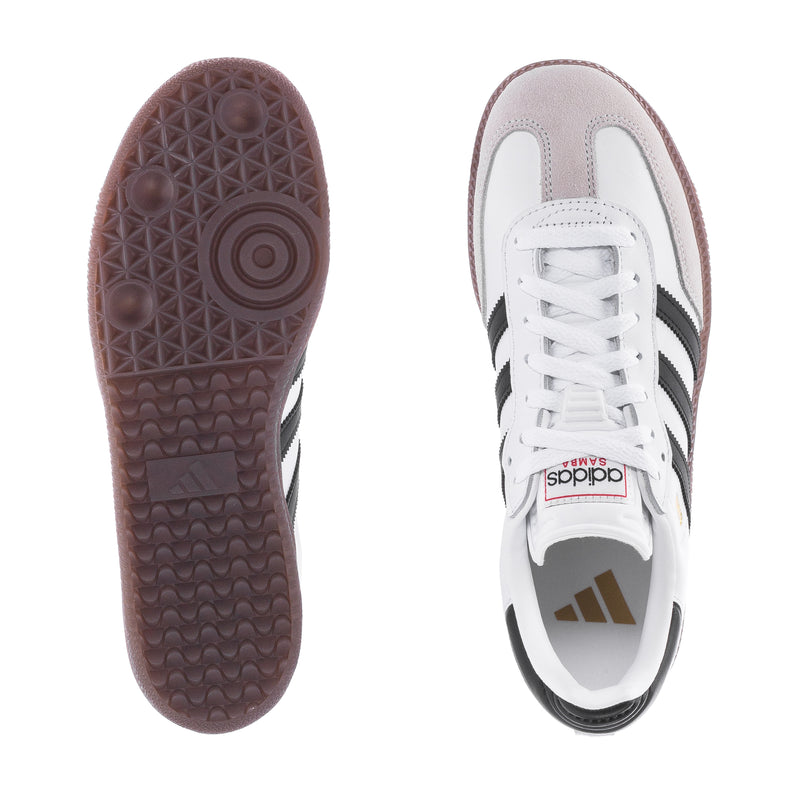 Youth sneaker outsole and heel, brown tread and white upper with three black stripes