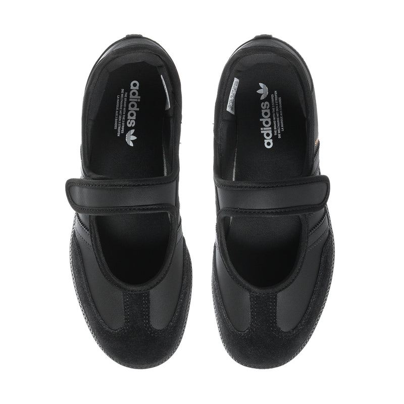 Pair of black Mary Jane sneakers showing front openings and adidas branding
