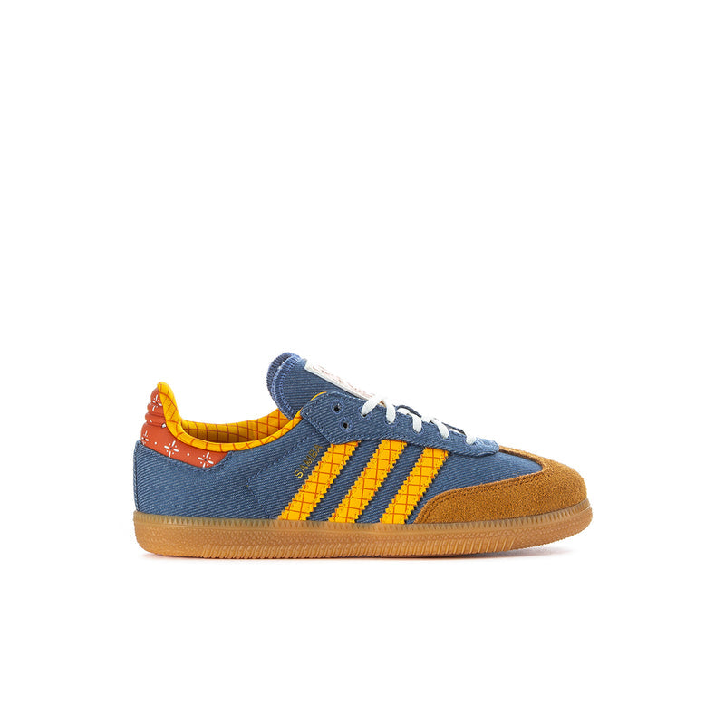 Kids denim blue sneakers with yellow stripes, orange heel detail, gum sole