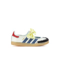 Kids sneakers with white upper, blue three-stripe panels, yellow bow, gum rubber sole