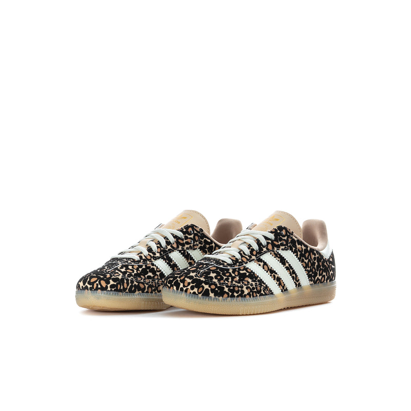 Kids Samba OG sneakers, side view with leopard print, white stripes, and gum sole