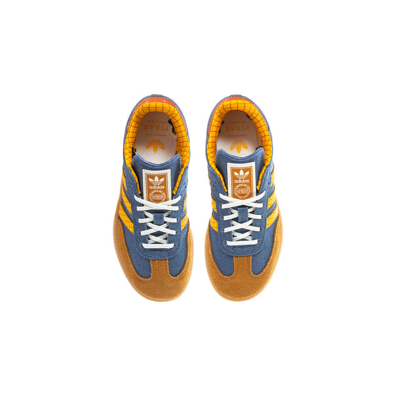 Kids sneakers with blue uppers, yellow grid lining, white laces, adidas tongue label